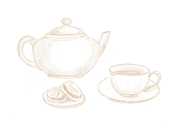 Une théière, une tasse de thé et des biscuits sur une soucoupe
