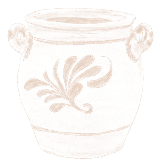 A white vase with handles and a painted floral motif at its center