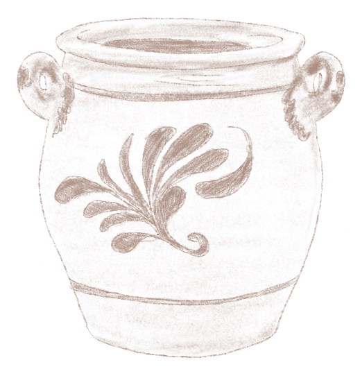 Un pot en céramique blanc avec des anses et un motif floral gravé