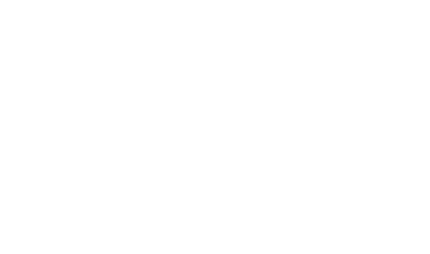 A close-up view of a white surface with light reflections
